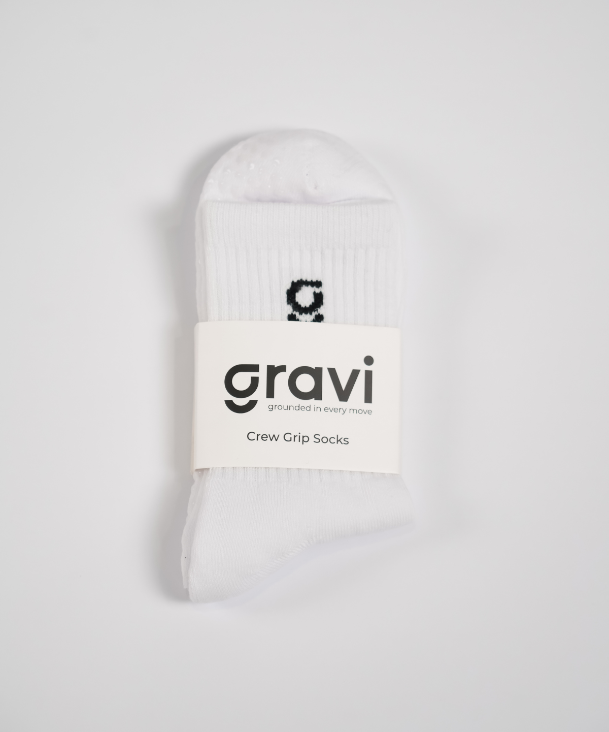 White sock with 'gravi' label on a light gray background