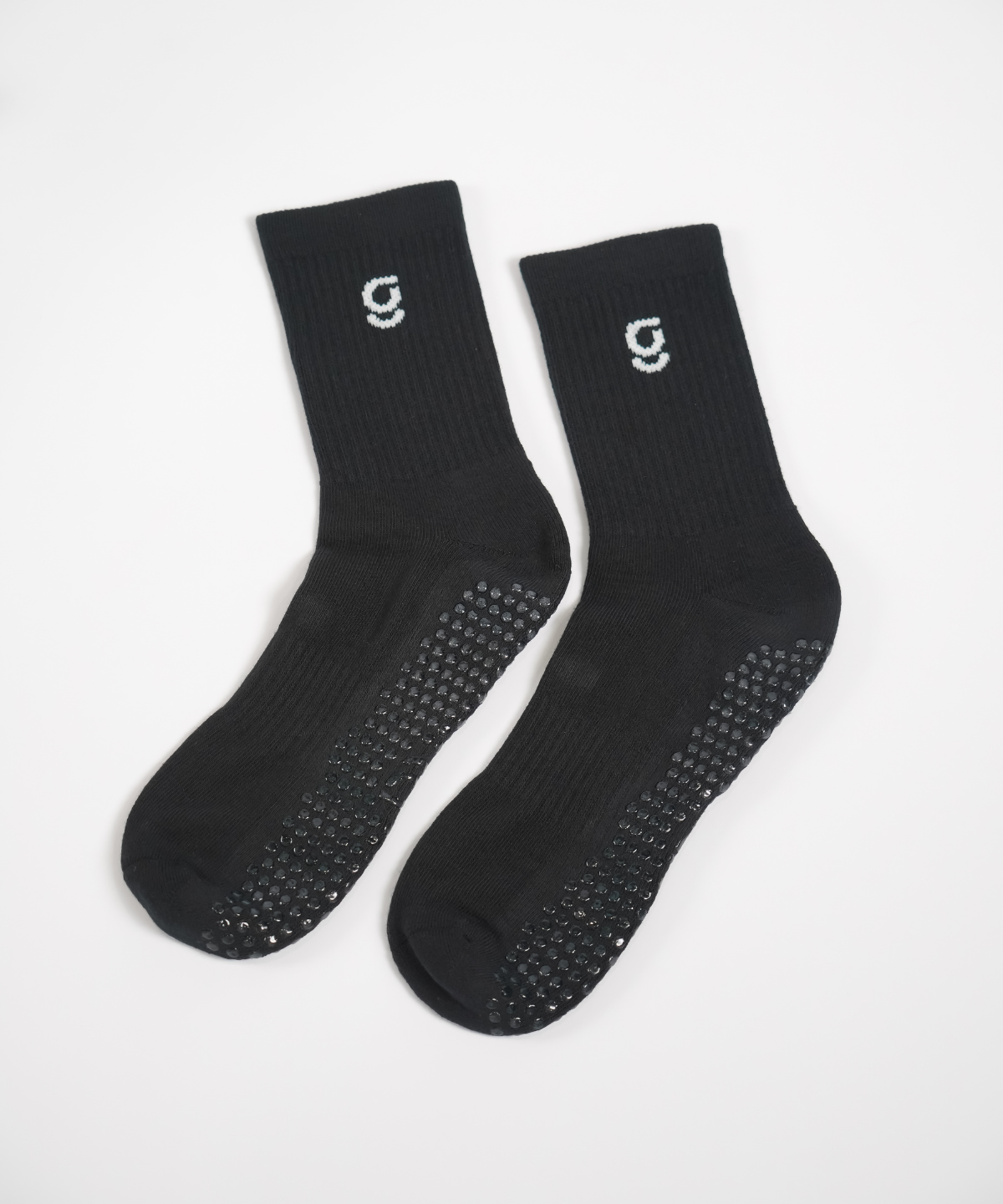 Black socks with a logo on a white background